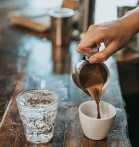 tonic and shot of espresso on wooden table