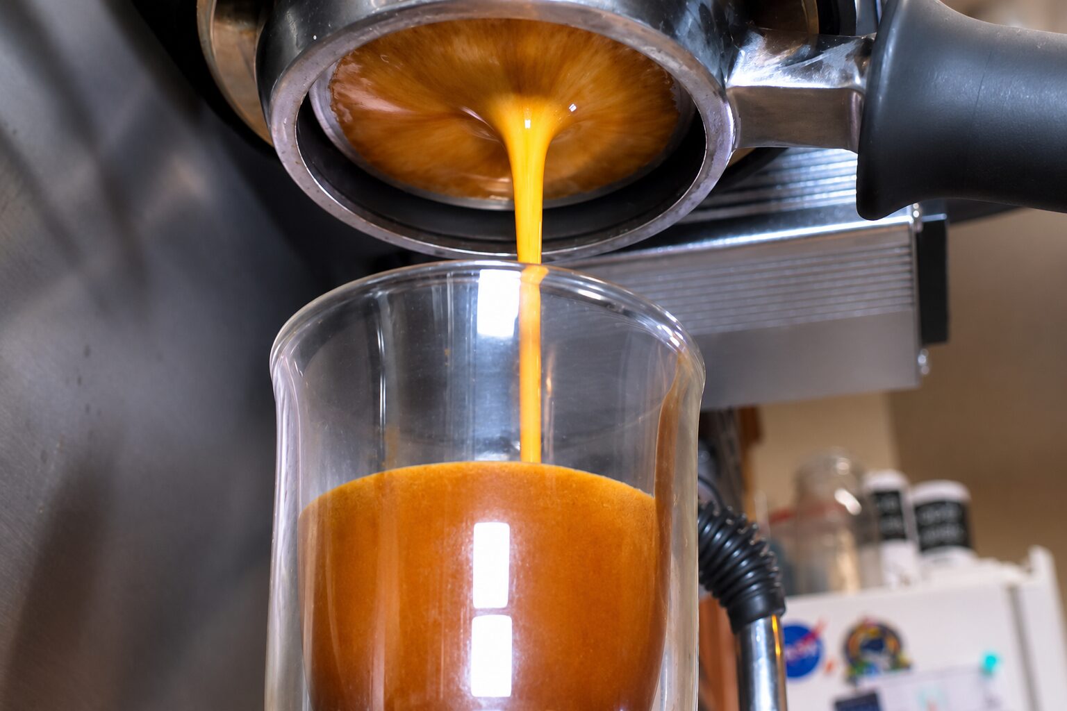 pulling a double shot of espresso for an iced Americano